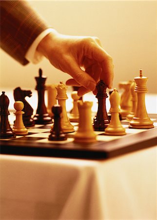 simsearch:700-00075674,k - Hand Lifting Chess Piece Stock Photo - Rights-Managed, Code: 700-00057804