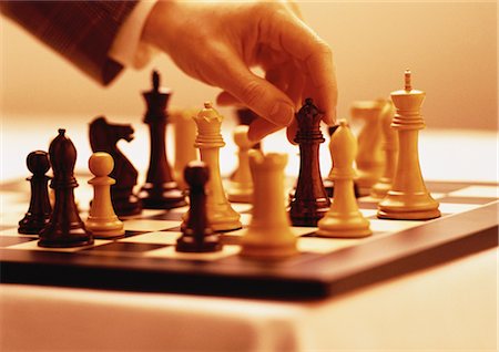 simsearch:700-00284729,k - Hand Lifting Chess Piece Stock Photo - Rights-Managed, Code: 700-00057805