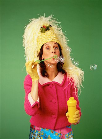 simsearch:700-00027399,k - Portrait of Mature Woman Wearing Hat, Blowing Bubbles Stock Photo - Rights-Managed, Code: 700-00057845