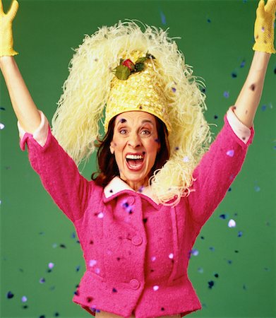 simsearch:700-00027399,k - Portrait of Mature Woman Wearing Hat, Throwing Confetti Stock Photo - Rights-Managed, Code: 700-00057848