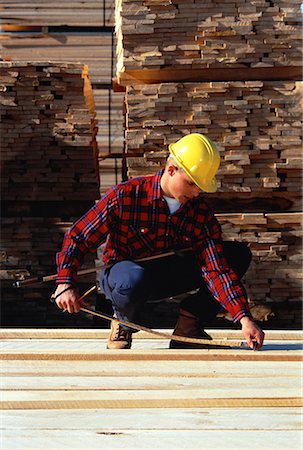 Man Measuring Lumber Sizes, Ontario, Canada Stock Photo - Rights-Managed, Code: 700-00058632