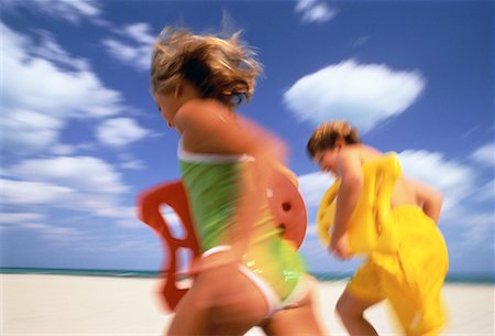 simsearch:700-00092986,k - Blurred View of Boy and Girl in Swimwear, Running on Beach Miami Beach, Florida, USA Stock Photo - Rights-Managed, Code: 700-00059819