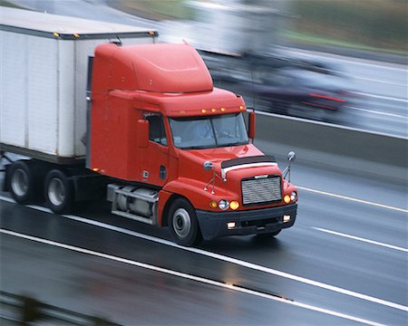 simsearch:700-00068576,k - Transport Truck Speeding on Highway Stock Photo - Rights-Managed, Code: 700-00051481