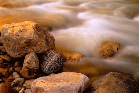 simsearch:700-00073991,k - Close-Up of Water Rushing over Rocks, Tetsa River British Columbia, Canada Stock Photo - Rights-Managed, Code: 700-00052369