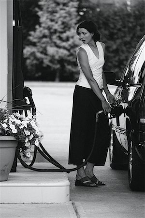 simsearch:6105-05395912,k - Woman At Gas Station, Filling Gas Tank, Etobicoke, ON, Canada Stock Photo - Rights-Managed, Code: 700-00064224