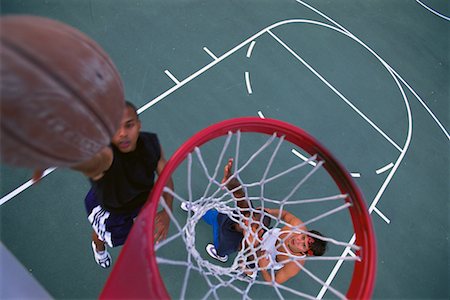 simsearch:632-06317210,k - Overhead View of Three Men Playing Basketball Foto de stock - Con derechos protegidos, Código: 700-00064599