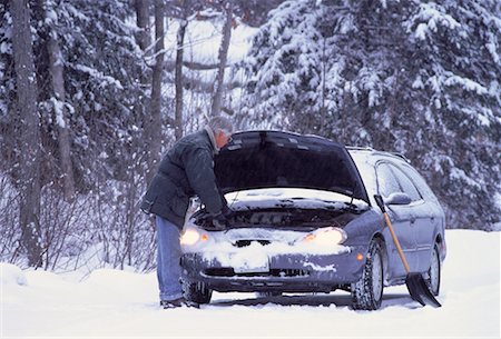 Mature Man with Stalled Car at Roadside in Winter, ON, Canada Stock Photo - Rights-Managed, Code: 700-00065024