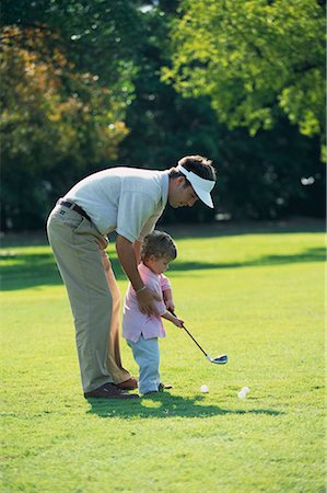 simsearch:700-00036949,k - Father Teaching Child To Play Golf Stock Photo - Rights-Managed, Code: 700-00065283