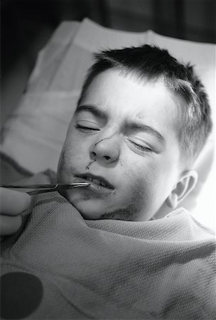 simsearch:700-00047115,k - Close-Up of Boy Getting Stitches In Face Stock Photo - Rights-Managed, Code: 700-00065435