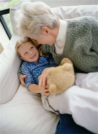 simsearch:700-00046927,k - Grandmother and Granddaughter On Sofa with Teddy Bear Stock Photo - Rights-Managed, Code: 700-00065547