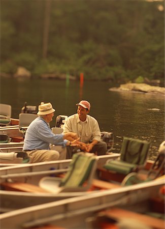 simsearch:700-00078908,k - Mature Father and Son in Boat Talking, Belgrade Lakes, ME, USA Stock Photo - Rights-Managed, Code: 700-00066252
