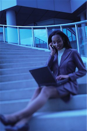 simsearch:700-00083403,k - Businesswoman Sitting on Steps Using Cell Phone and Laptop Stock Photo - Rights-Managed, Code: 700-00066652