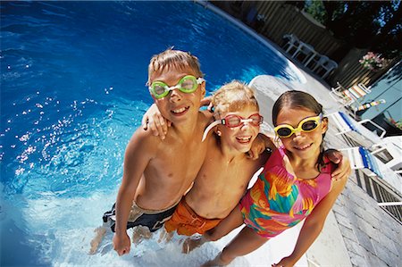 simsearch:649-01696512,k - Portrait of Children in Swimwear And Goggles near Swimming Pool Stock Photo - Rights-Managed, Code: 700-00066666