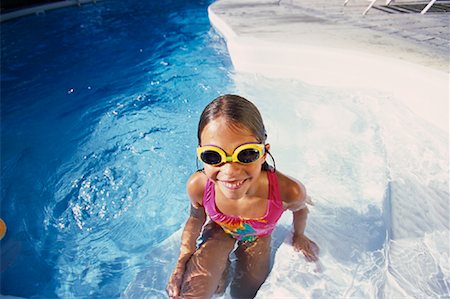 simsearch:700-00057270,k - Portrait of Girl in Swimwear and Goggles, Sitting in Swimming Pool Stock Photo - Rights-Managed, Code: 700-00066823