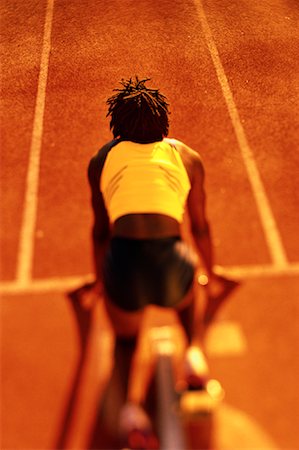 simsearch:700-00157314,k - Back View of Woman at Starting Position on Running Track Stock Photo - Rights-Managed, Code: 700-00066935