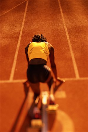 simsearch:700-00157314,k - Back View of Woman at Starting Position on Running Track Stock Photo - Rights-Managed, Code: 700-00066936