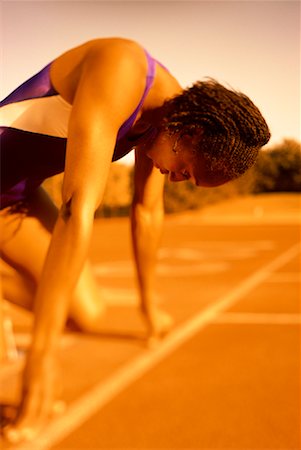 simsearch:700-00157314,k - Woman at Starting Position on Running Track Stock Photo - Rights-Managed, Code: 700-00066938