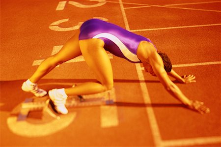 simsearch:700-00157314,k - Woman at Starting Position on Running Track Stock Photo - Rights-Managed, Code: 700-00066939