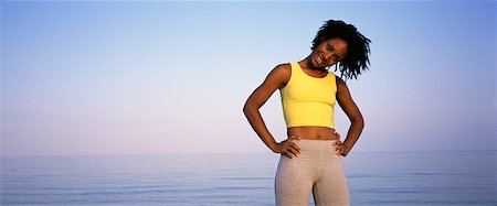 peter griffith - Portrait of Young Woman with Hands on Hips Outdoors Stock Photo - Rights-Managed, Code: 700-00067056