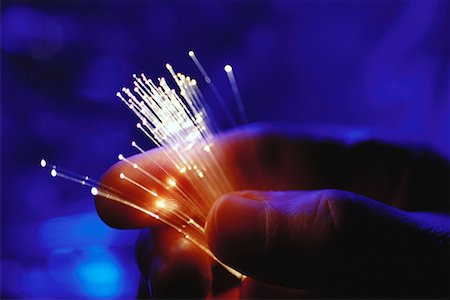 simsearch:614-05399875,k - Close-Up of Hand Holding Fiber Optics Stock Photo - Rights-Managed, Code: 700-00067124