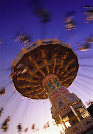 Amusement Park Rides at Dusk Stock Photo - Rights-Managed, Code: 700-00067237