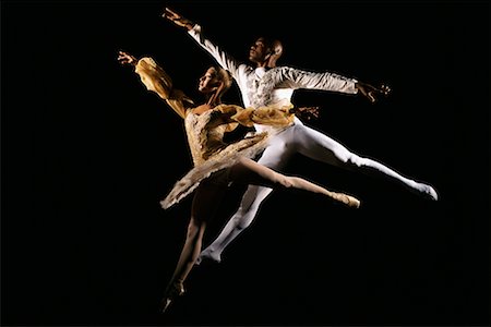 dramatic dancer jump photography - Man and Woman Dancing in Studio Stock Photo - Rights-Managed, Code: 700-00068388