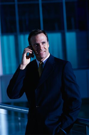 simsearch:700-00163379,k - Businessman Using Cell Phone near Office Tower, Toronto, Ontario Canada Stock Photo - Rights-Managed, Code: 700-00068443