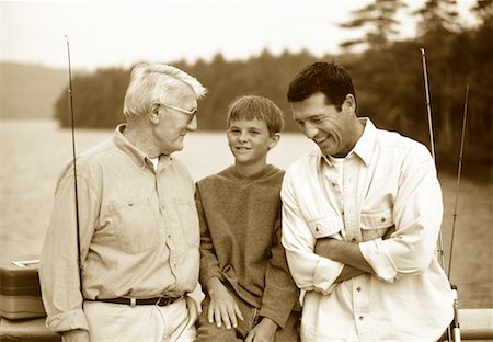 simsearch:700-00361698,k - Grandfather, Father and Son on Bridge with Fishing Equipment Stock Photo - Rights-Managed, Code: 700-00068626