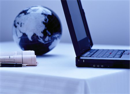 simsearch:700-00045162,k - Laptop, Globe, Pen and Newspaper Stock Photo - Rights-Managed, Code: 700-00069435