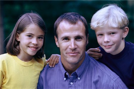 simsearch:700-00069467,k - Portrait of Father, Son and Daughter Outdoors, Toronto Ontario, Canada Stock Photo - Rights-Managed, Code: 700-00069451