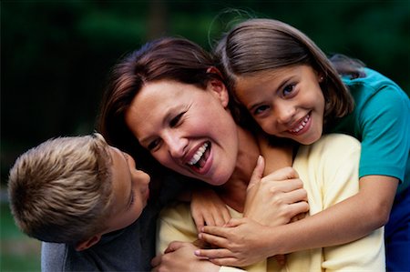 simsearch:700-00069467,k - Mother, Son and Daughter Embracing Outdoors, Toronto, ON Canada Stock Photo - Rights-Managed, Code: 700-00069466