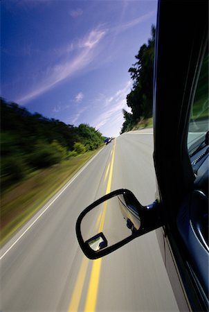 simsearch:700-00089787,k - Blurred Road and Side View Mirror Woodbridge, Ontario, Canada Stock Photo - Rights-Managed, Code: 700-00069501
