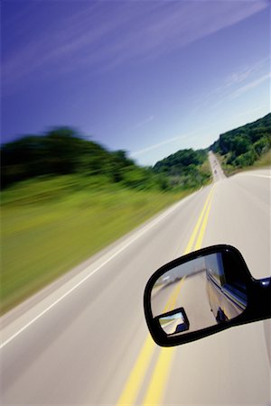simsearch:700-00089787,k - Blurred Road and Rear View Mirror Woodbridge, Ontario, Canada Stock Photo - Rights-Managed, Code: 700-00069502