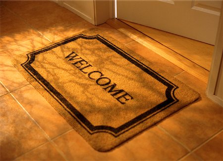 door welcome doormat - Welcome Mat in Doorway Stock Photo - Rights-Managed, Code: 700-00069776