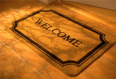 door welcome doormat - Welcome Mat in Doorway Stock Photo - Rights-Managed, Code: 700-00069777