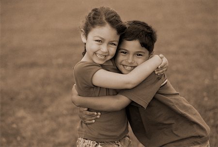 simsearch:700-00088996,k - Portrait of Boy and Girl Embracing Outdoors Stock Photo - Rights-Managed, Code: 700-00060114