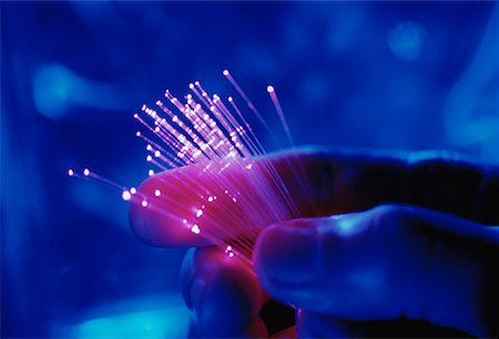 simsearch:614-05399875,k - Close-Up of Hand Holding Fiber Optics Stock Photo - Rights-Managed, Code: 700-00060228