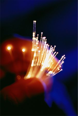 simsearch:614-05399875,k - Close-Up of Hand Holding Fiber Optics Stock Photo - Rights-Managed, Code: 700-00060308