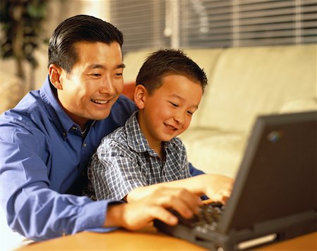 peter griffith - Father and Son Using Laptop Computer Stock Photo - Rights-Managed, Code: 700-00060862