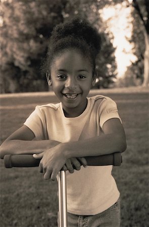 simsearch:700-00088996,k - Portrait of Girl with Scooter Outdoors Stock Photo - Rights-Managed, Code: 700-00060890