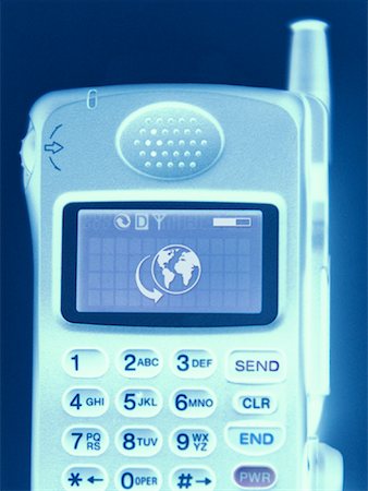 simsearch:700-03058963,k - Globe on Cell Phone Stock Photo - Rights-Managed, Code: 700-00061082