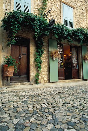 provence street scenes - Storefront and Ivy, Moustiers St. Marie, Provence, France Stock Photo - Rights-Managed, Code: 700-00061515