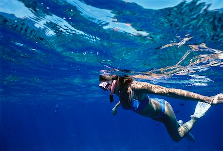 Underwater vue de femme snorkeling près de Molokini île de Maui, Hawaii, USA Photographie de stock - Rights-Managed, Code: 700-00062420