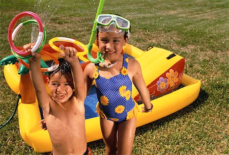 simsearch:700-00280017,k - Boy and Girl in Swimwear near Inflatable Pool Stock Photo - Rights-Managed, Code: 700-00062492