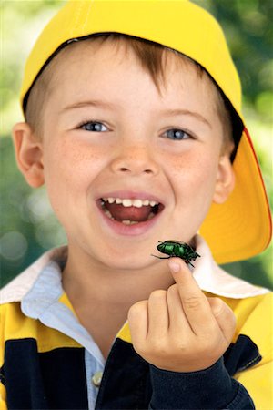 simsearch:700-00477662,k - Portrait of Boy with Insect on Fingertip, Smiling Stock Photo - Rights-Managed, Code: 700-00074254