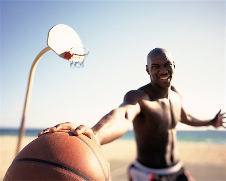simsearch:700-00060777,k - Portrait of Man Holding Basketball Outdoors Stock Photo - Rights-Managed, Code: 700-00074669