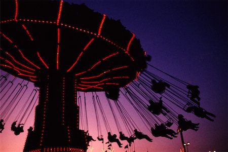 Amusement Park Ride at Dusk Stock Photo - Rights-Managed, Code: 700-00074724