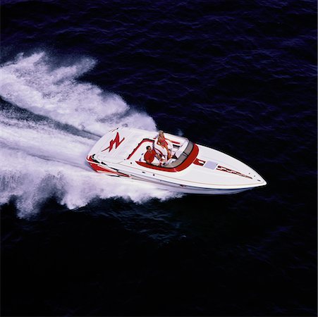simsearch:700-00082926,k - Aerial View of Couple in Speedboat, Bay Area, Florida, USA Stock Photo - Rights-Managed, Code: 700-00074792
