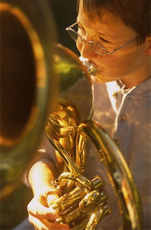 simsearch:700-03299206,k - Boy Playing Baritone Horn Foto de stock - Con derechos protegidos, Código: 700-00075265