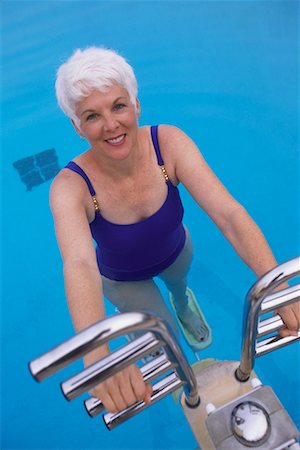 simsearch:700-00057270,k - Portrait of Mature Woman in Swimwear, Using Exercise Equipment in Swimming Pool Stock Photo - Rights-Managed, Code: 700-00075431